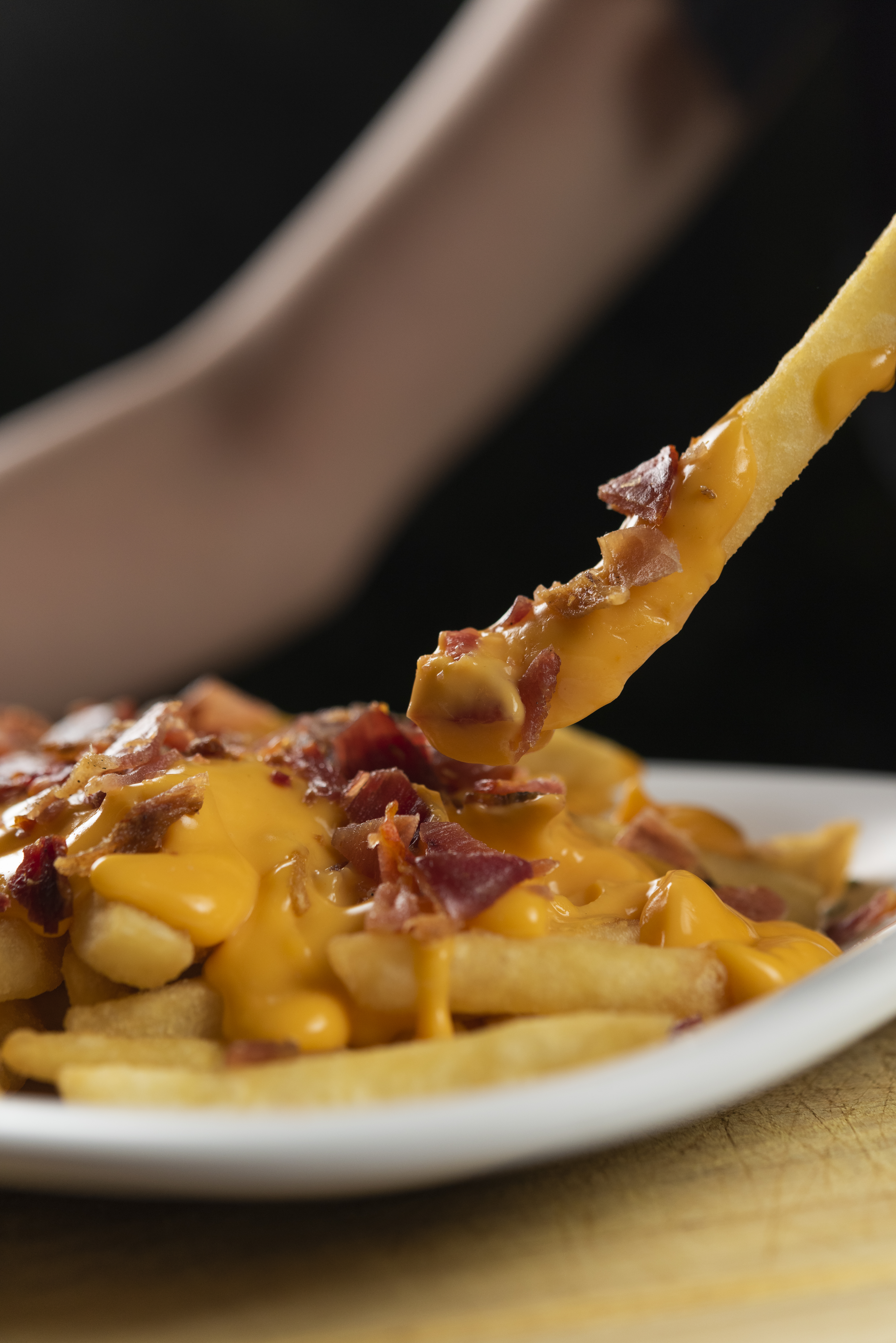 delicious fries with cheddar cheese and bacon